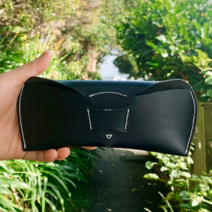 Black leather glasses case - front and inside view