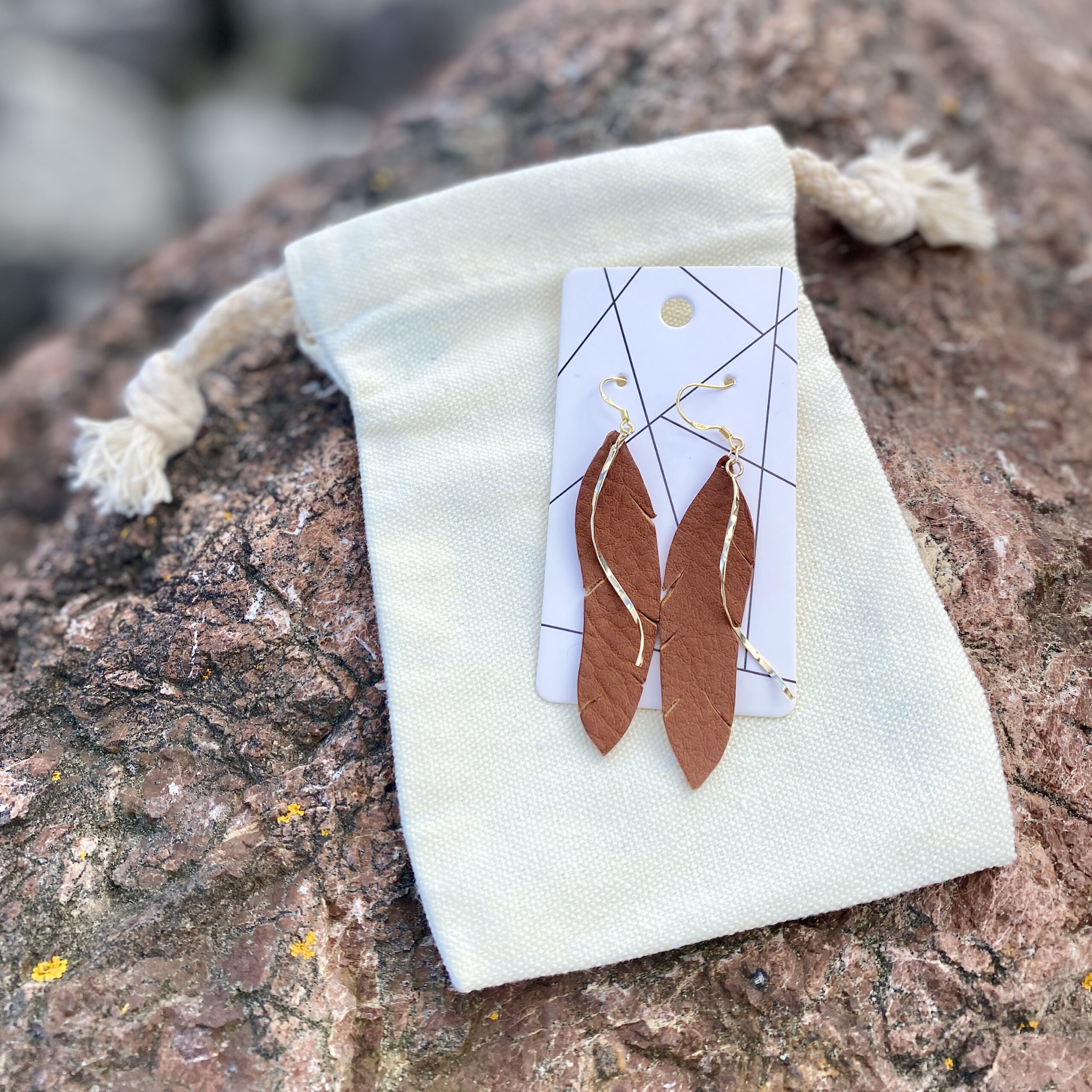 Leather earrings - feather